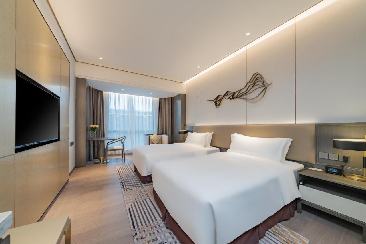 Holiday Inn Zhengzhou Zhongzhou By Ihg Zewnętrze zdjęcie